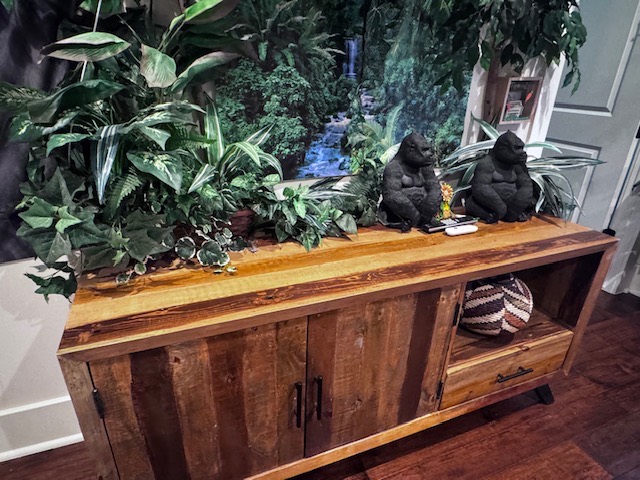 Wooden cabinet with rainforest decorations