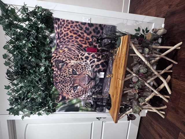 Leopard artwork and decorative wooden table
