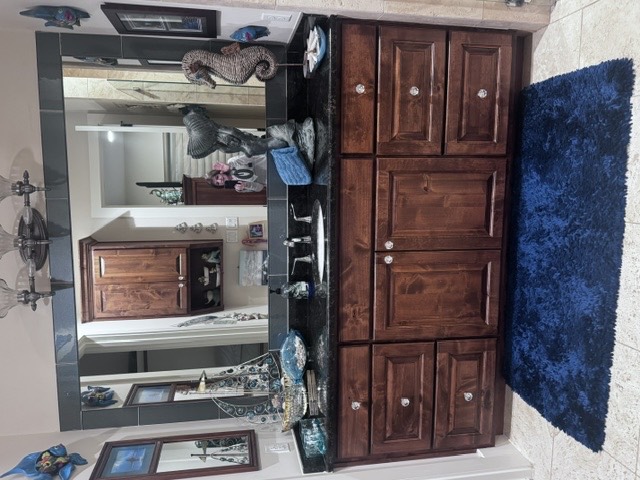 Peacock Forest Room bathroom vanity with blue accents
