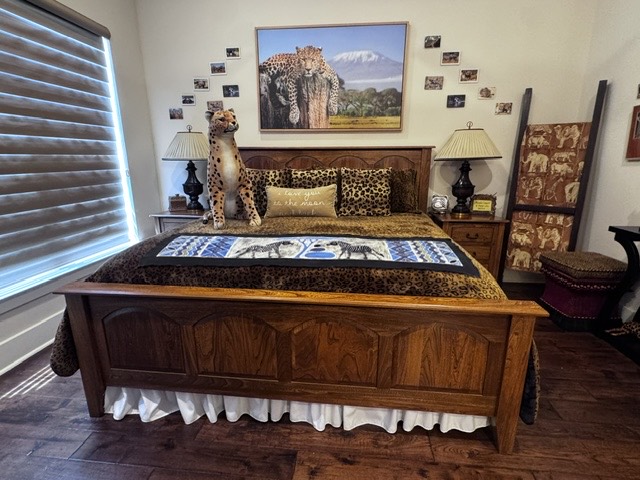 Wooden bed and animal-inspired décor in the Wild Safari Room
